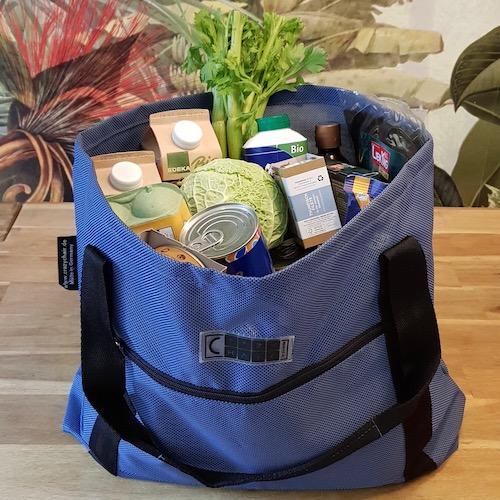 Wiederverwendbare Einkaufstasche aus reißfestem Mikrogittergewebe – umweltfreundlich, stabil und ideal für den Wochenmarkt.